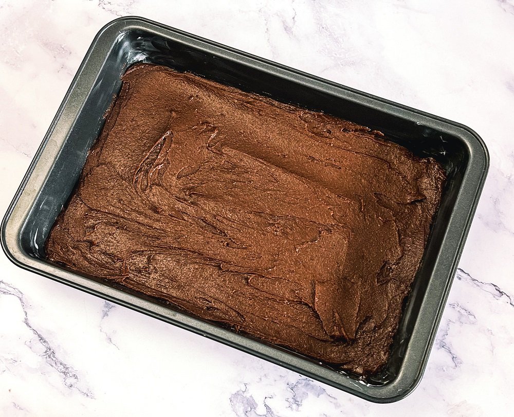 Brownie batter in pan