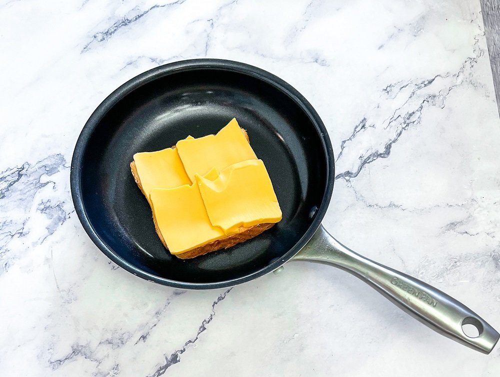 Bread and cheese in pan