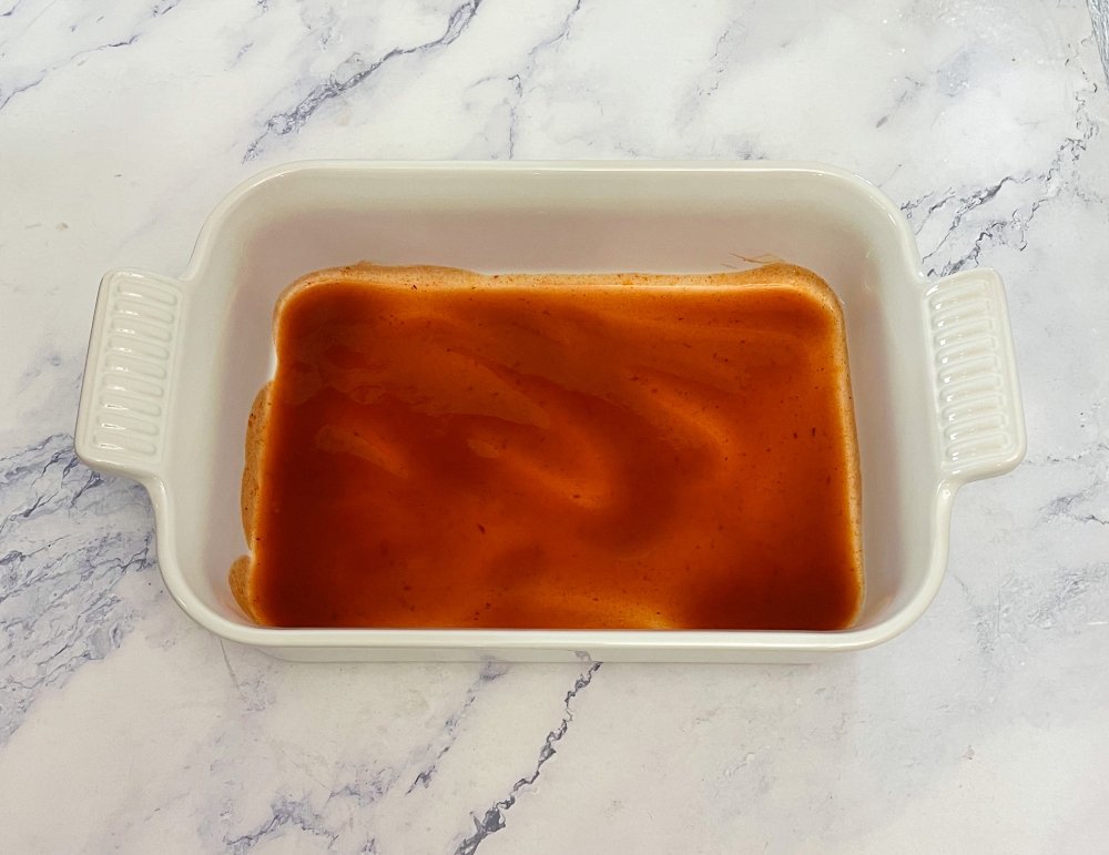 enchilada sauce in pan