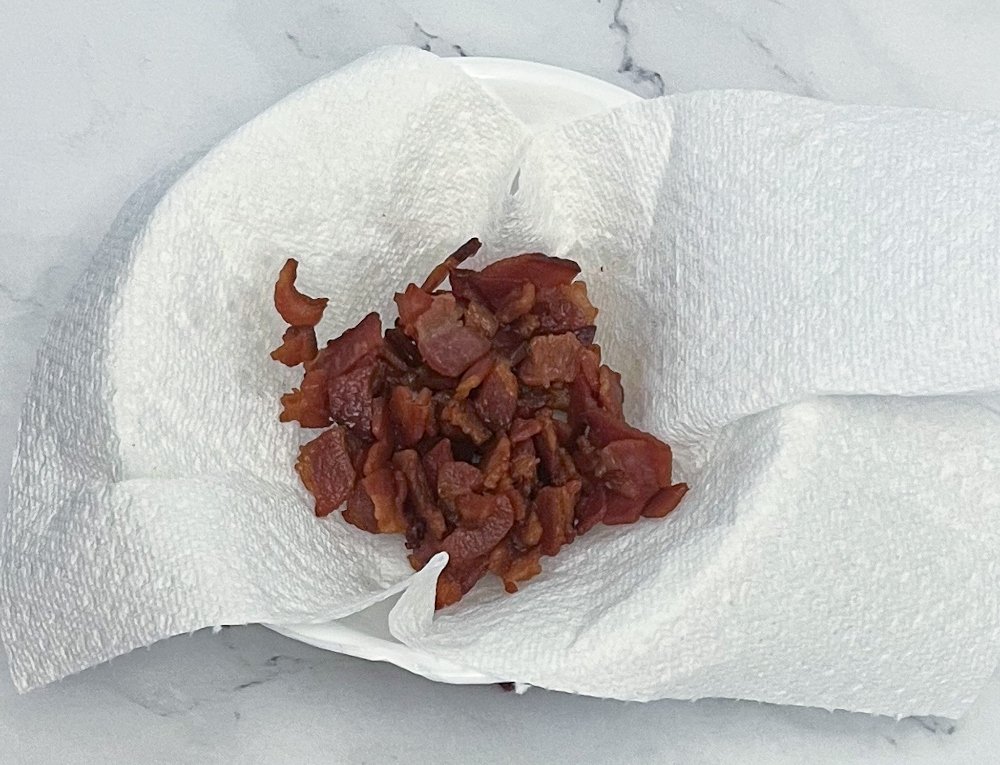 draining bacon in paper towels