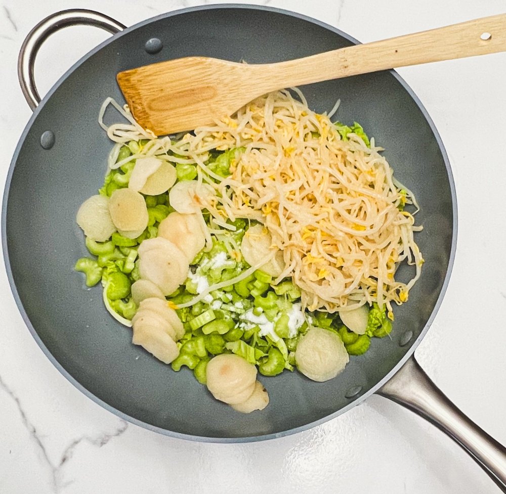 chicken chow mein ingredients in wok