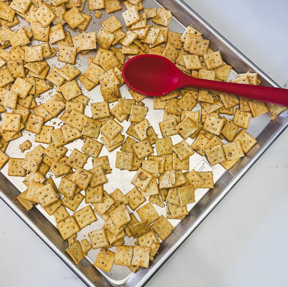 stirring seasoned crackers