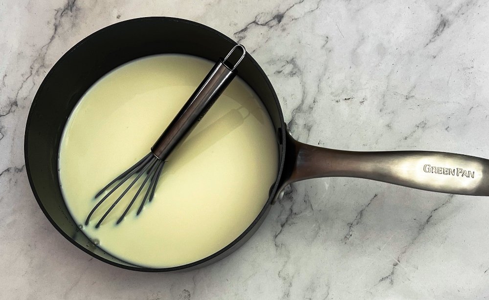 whisking chocolate pudding