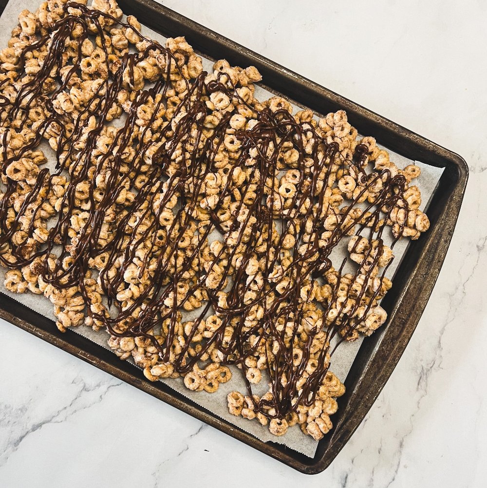 Honey nut cheerios drizzled with chocolate