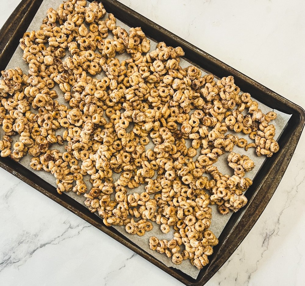 Honey nut cheerios on baking sheet