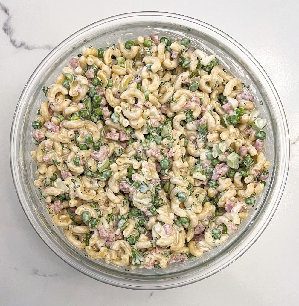 Macaroni salad mixed together 