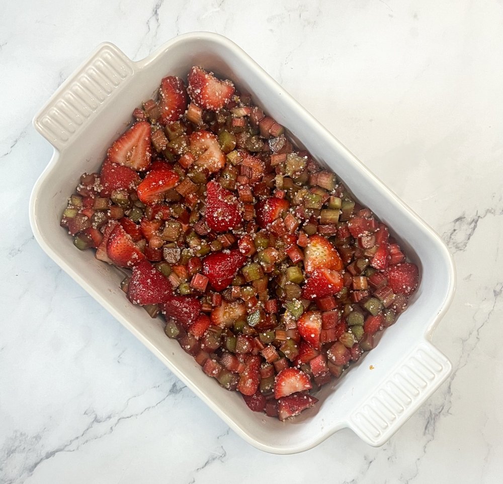 strawberries and rhubarb in baking pan