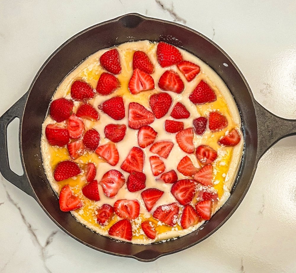 Skillet strawberry cobbler ready to bake