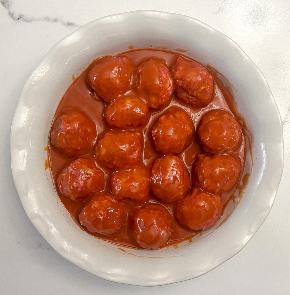 Meatballs covered in tomato soup