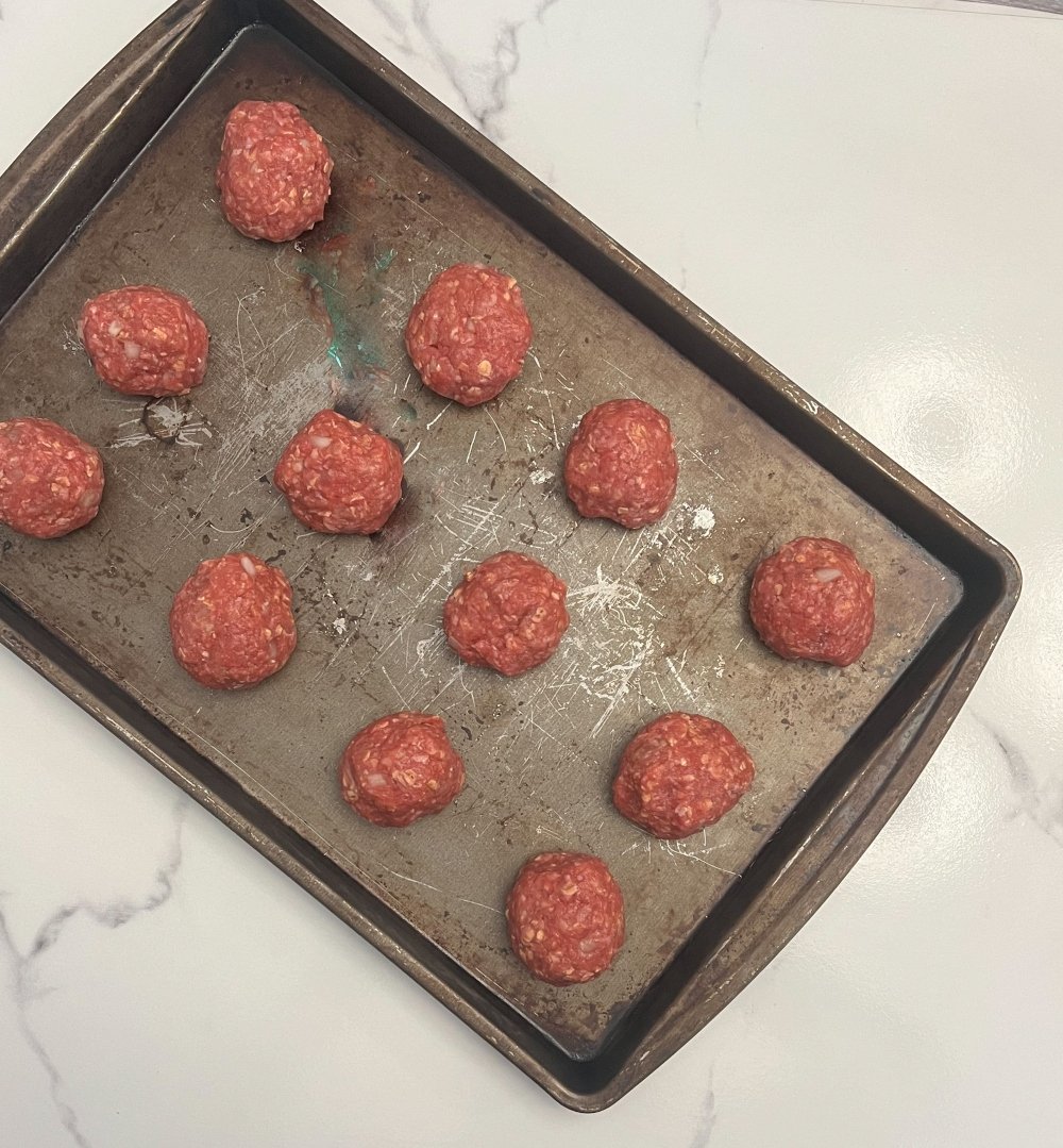 Meatballs on baking sheet 