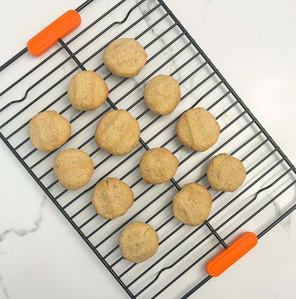 Snickerdoodles cooling on a wire rack