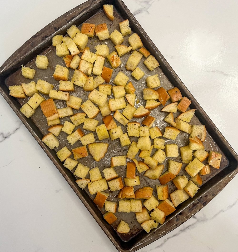 Croutons on baking sheet