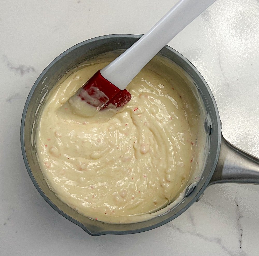 Crushed candy canes mixed into melted white chocolate