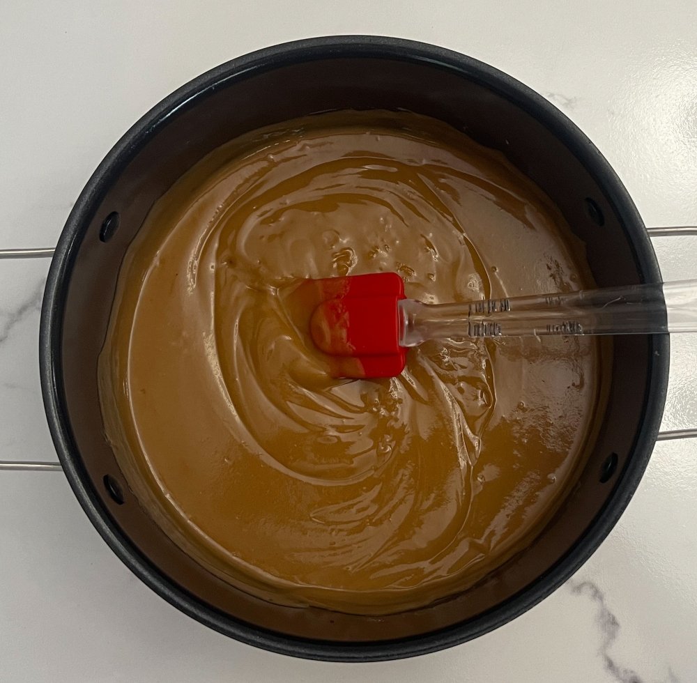 melting peanut butter, butter, honey and caramel sauce