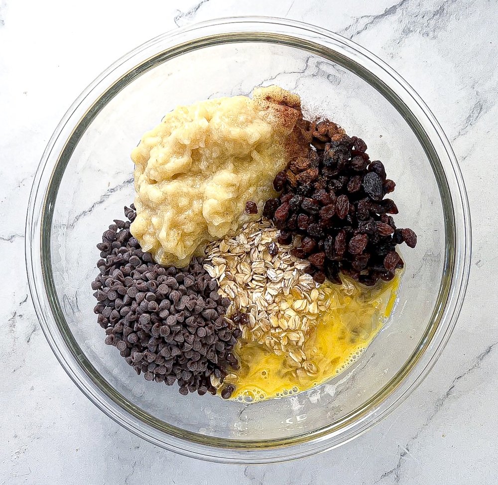 Banana breakfast cookie ingredients in a bowl