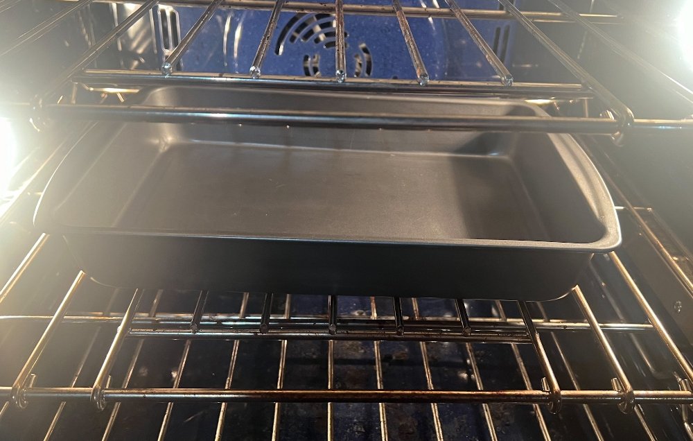 Heating baking pan in oven