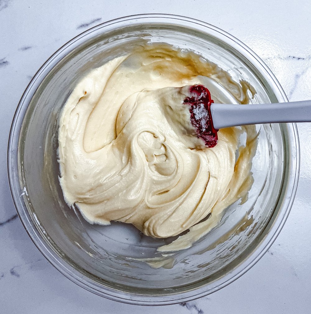 Mixing in powdered sugar and vanilla