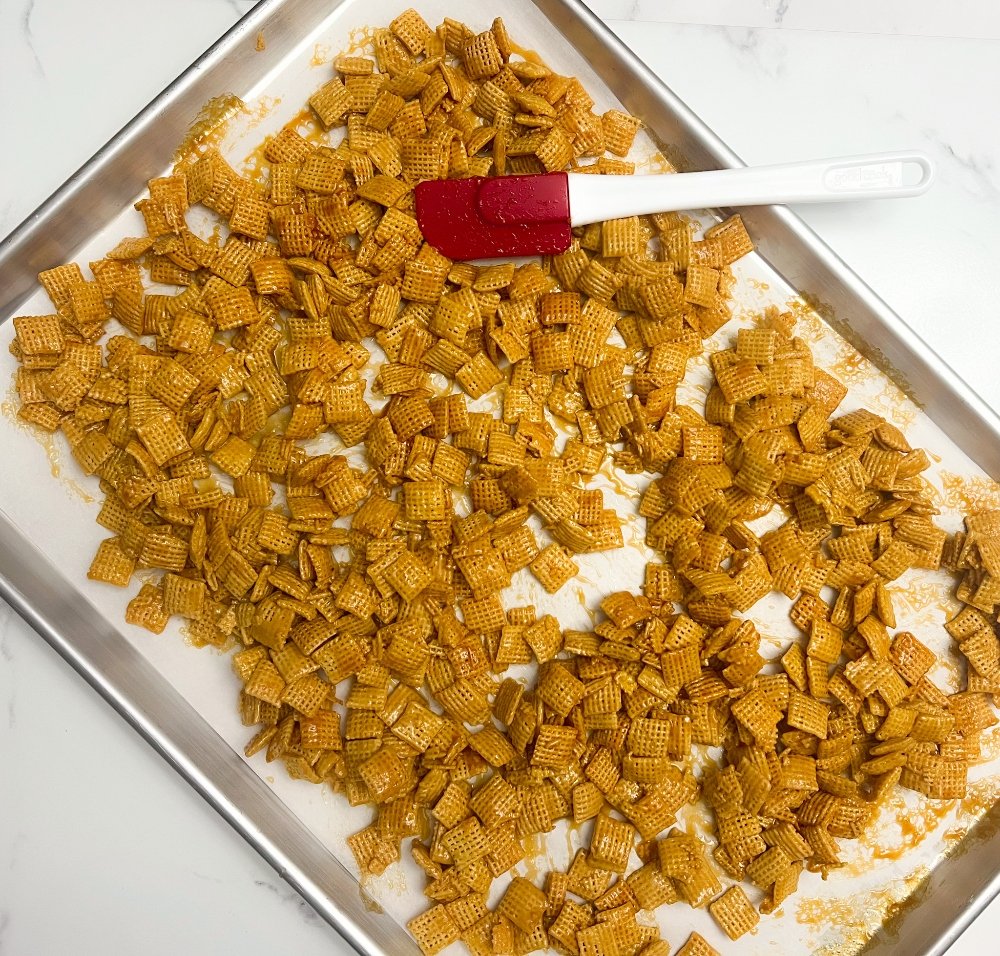 Stirring caramel chex crunch