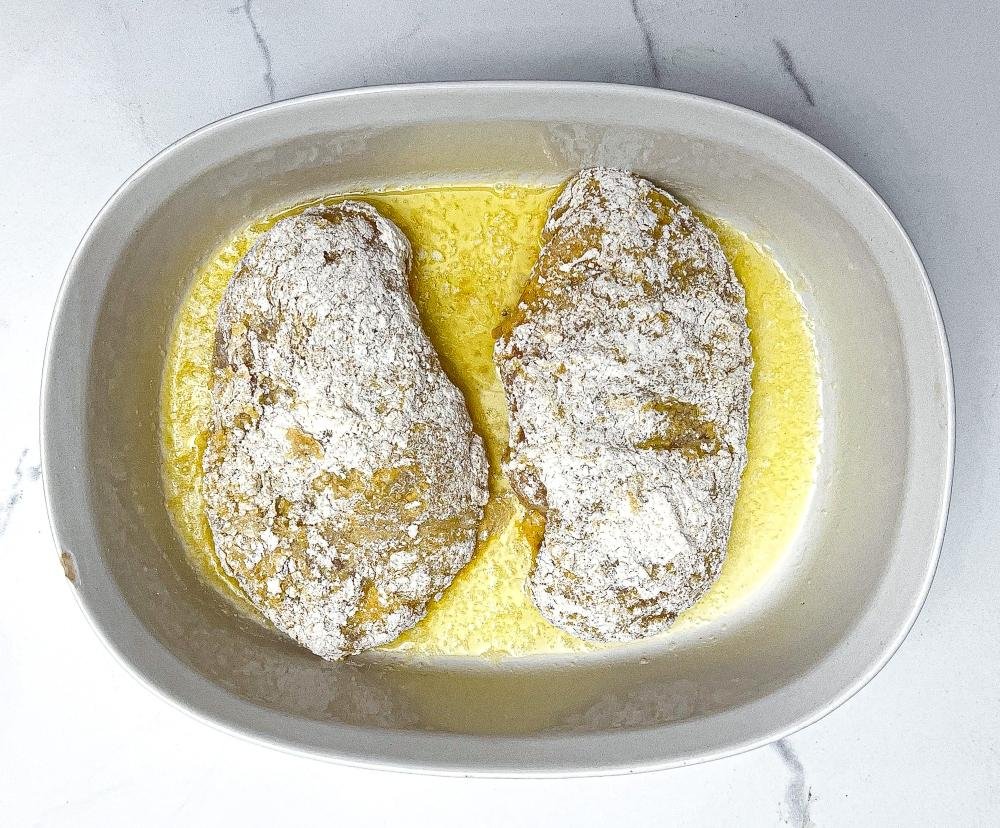 Coated chicken in hot baking dish